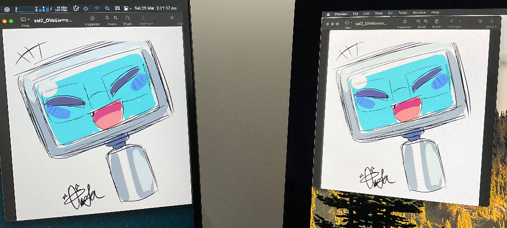 Photo of M28U and iMac next to each other, both showing an image of a cartoon robot